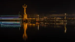 Night shot with illuminated sculpture Imperia